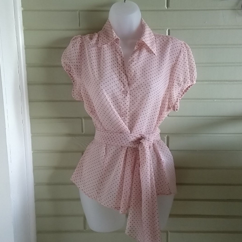 Pink and black polka dotted blouse